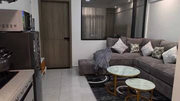 Deluxe Apartment, City View | Ruang tamu