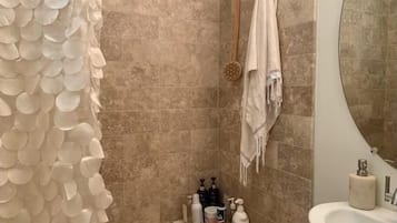 Eco-friendly toiletries, hair dryer, towels, soap