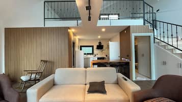 Deluxe Villa, Pool View | Living area