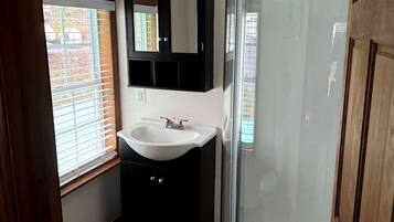 Shower, hair dryer, shampoo