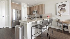 Fridge, dining tables - Landing | Stunning 1BD, Pool, Game Room (Katy)