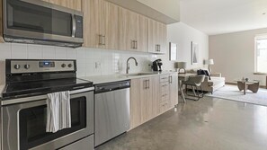 Fridge, dining tables - Landing | Beautiful 1BD, Rooftop Lounge, Clubhouse (Portland)