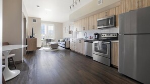 Fridge, dining tables - Landing | Modern 1BD, Clubhouse, Rooftop Lounge (Portland)