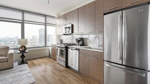 Fridge, dining tables - Landing | Stunning Studio, Rooftop Lounge, Gym (Chicago)