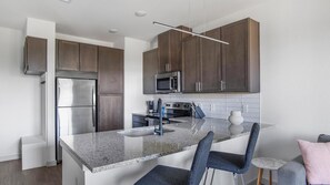Fridge, dining tables - Landing | Amazing 1BD, Pool, Gym (Dallas)