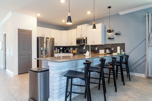 Fridge, microwave, oven, stovetop - Lakefront 9 Bedroom Villa: Arcade, Themed Rooms, Lazy River (Kissimmee)
