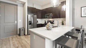 Fridge, dining tables - Landing | Incredible 1BD, Clubhouse, Yoga Studio (Las Vegas)