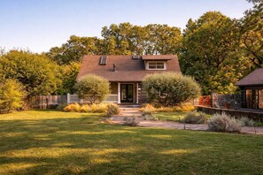 A two-story house with a front porch, a small deck, and a well-maintained lawn. - The Anderson - Calistoga , Pool, Near Vineyards (Calistoga)