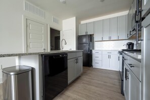 Fridge, dining tables - Landing | Stylish 1BD, Pool, Gym (Charlotte)