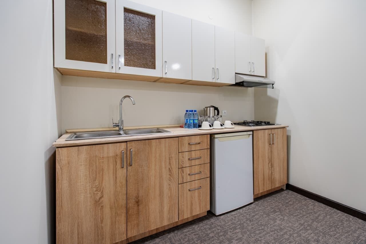 Familiestudio-suite - bjergudsigt | Privat køkken