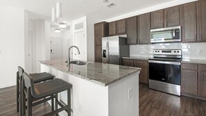 Fridge, dining tables - Landing | Chic 2BD, Yoga Studio, Clubhouse (Jacksonville)