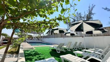 Outdoor pool, open 10:00 AM to 7:00 PM, pool umbrellas, sun loungers