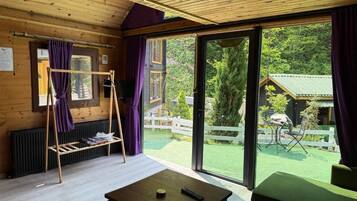 Triple Room, River View | Living area