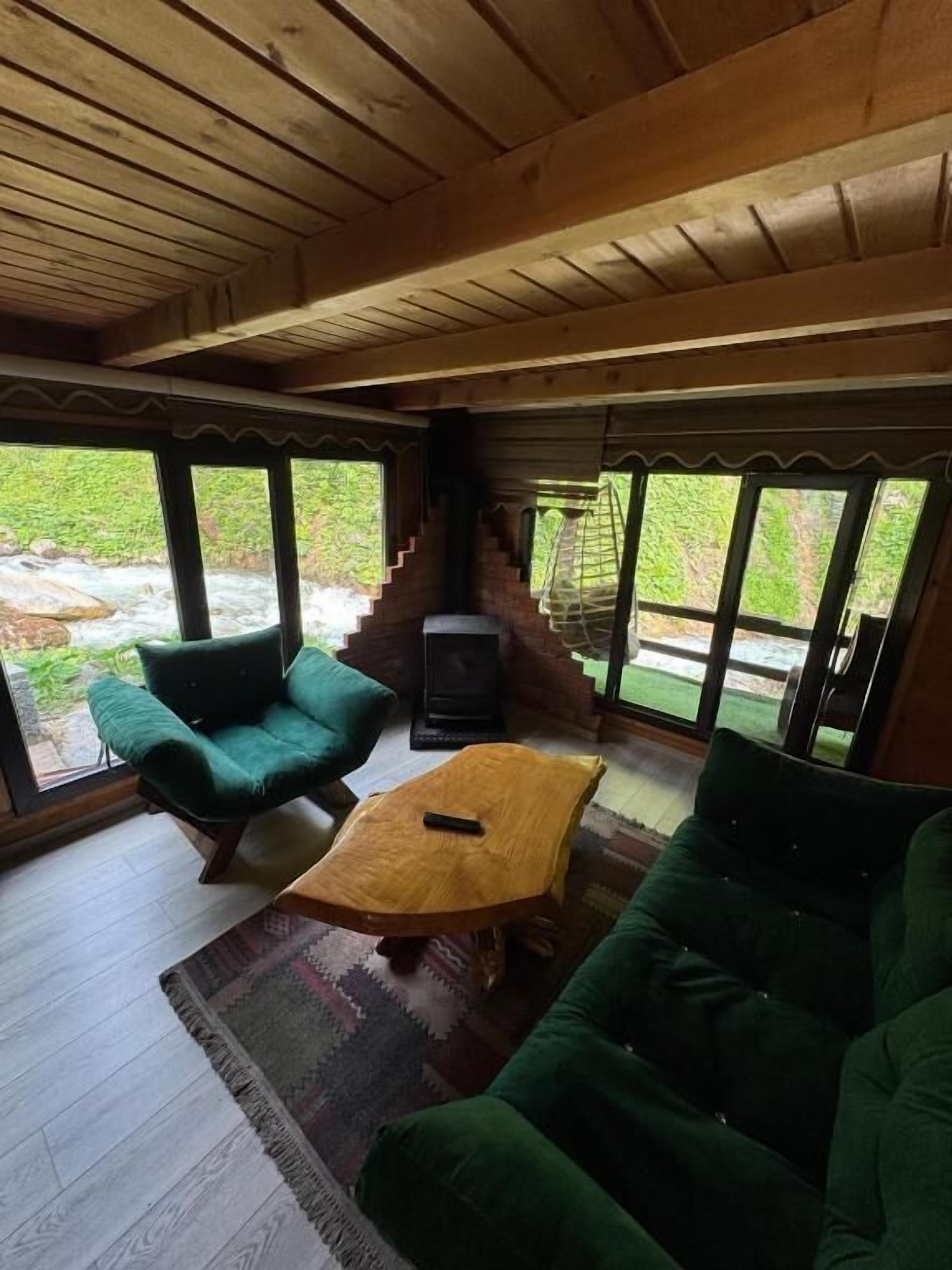Family Chalet, River View | Living area