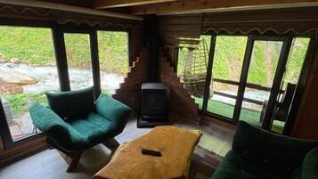 Family Chalet, River View | Living area