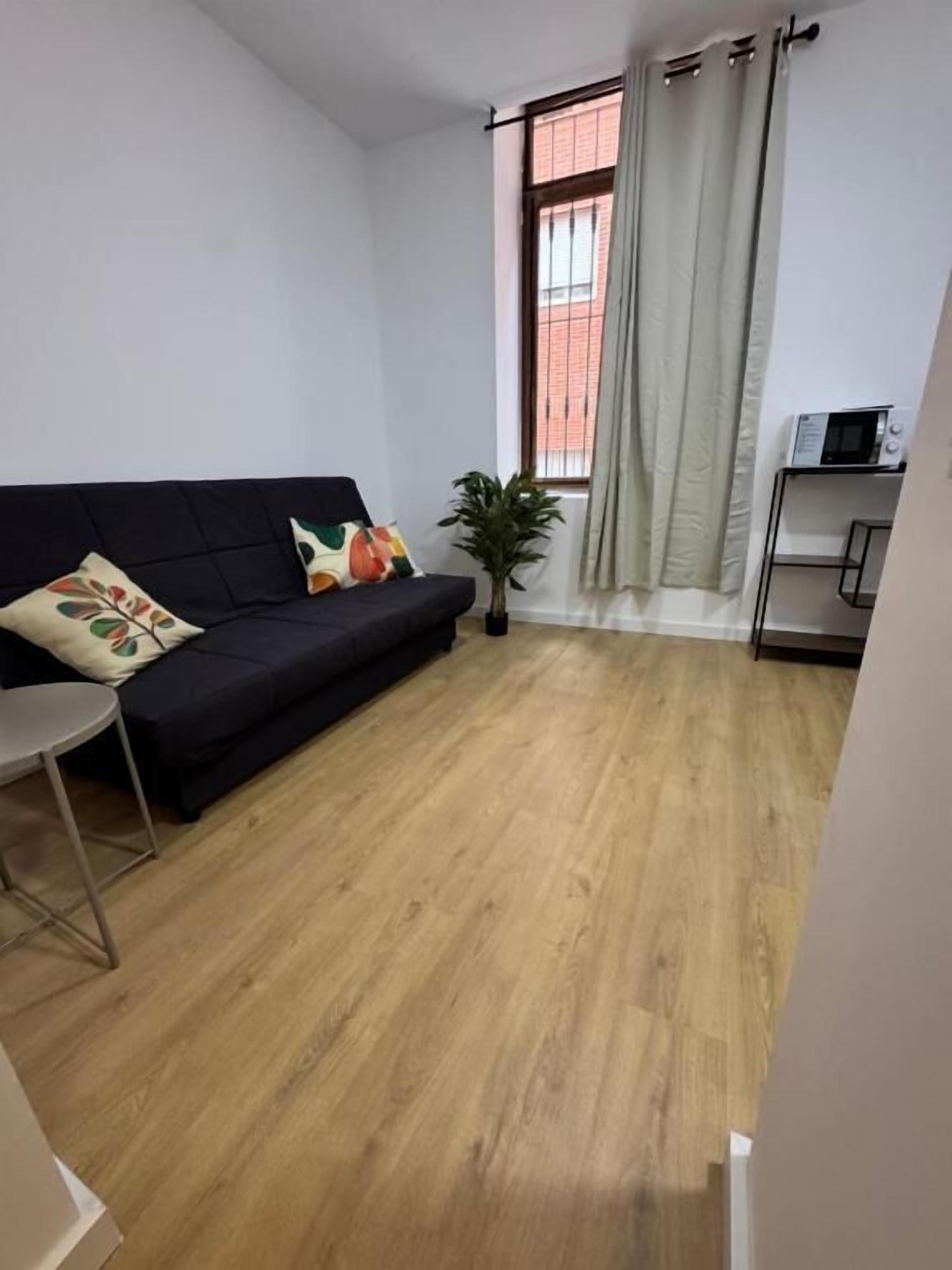 Apartamento Confort, vistas a la ciudad | Zona de estar