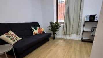 Apartamento Confort, vistas a la ciudad | Zona de estar