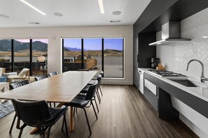 Fridge, dining tables - Landing | Chic 1BD in Downtown Bozeman (Bozeman)