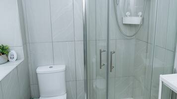 Hair dryer, towels, soap, toilet paper