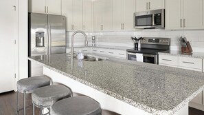 Fridge, dining tables - Landing | Stylish 2BD, Yoga Studio, Gym (Raleigh)
