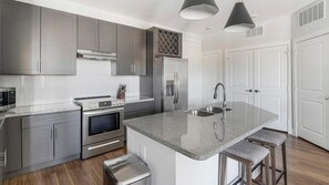 Fridge, dining tables - Landing | Stunning 1BD, Pool, Yoga Studio (Little Rock)