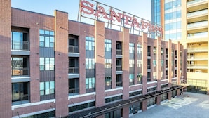 A multi-story building with a prominent sign reading 'SANTA FE.' - Landing | Spectacular 1BD, Clubhouse (Tulsa)
