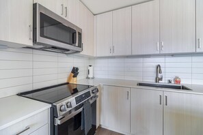 Fridge, dining tables - Landing | Modern 1BD, Game Room, Yoga Studio (Murrieta)