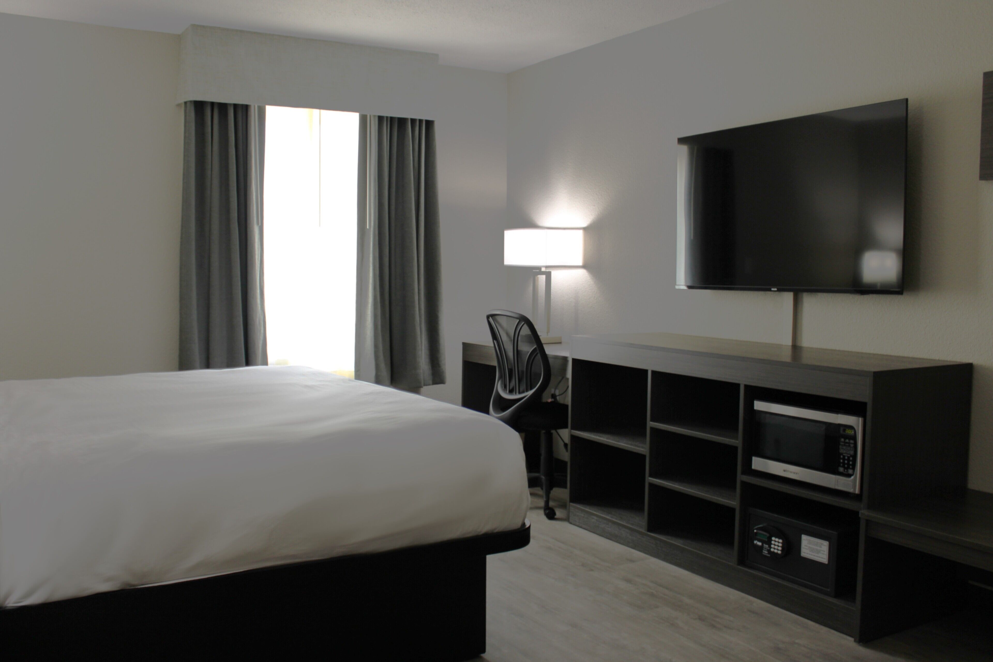 Chambre Simple, 1 très grand lit, accessible aux personnes à mobilité réduite (Guestroom)