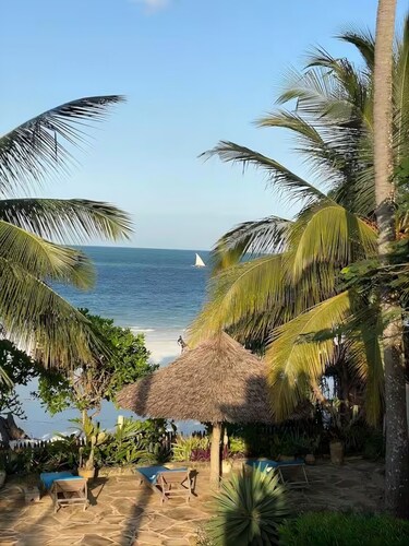Private beachfront villa with pool