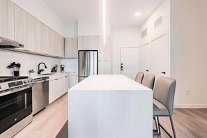 Fridge, dining tables - Landing | Beautiful 1BD, Courtyard, Gym (Houston)