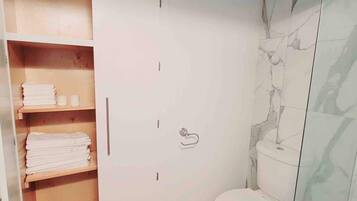 Shower, hair dryer, shampoo