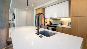 Fridge, dining tables - Landing | Beautiful 2BD, Gym, Yoga Studio (San Antonio)