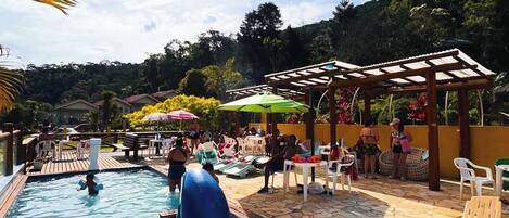 2 indoor pools, 3 outdoor pools, open 9:00 AM to 6:00 PM, pool umbrellas