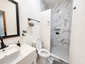 Shower, hair dryer, towels, soap - CABO DOWNTOWN STUDIOS: Modern Queen Bed retreat #7 (Cabo San Lucas)