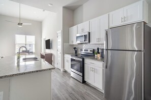 Fridge, dining tables - Landing | Incredible 3BD, Gym, Clubhouse (Harvey)