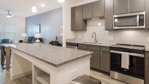 Fridge, dining tables - Landing | Amazing 1BD, Yoga Studio, Gym (Summerville)