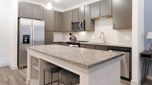Fridge, dining tables - Landing | Spectacular 1BD, Gym, Yoga Studio (Summerville)