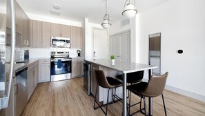 Fridge, dining tables - Landing | Stylish 1BD, Gym, Pool (Austin)