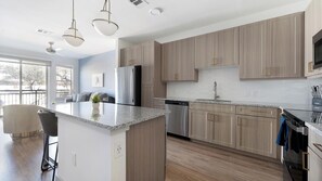 Fridge, dining tables - Landing | Amazing 1BD, Clubhouse, Gym (Austin)