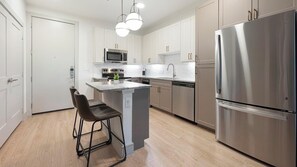Fridge, dining tables - Landing | Incredible 1BD, Gym, Pool (Austin)