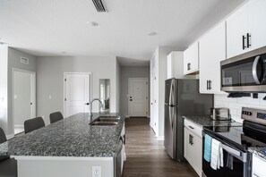 Fridge, dining tables - Landing | Beautiful 2BD, Pool, Gym (Palm Bay)
