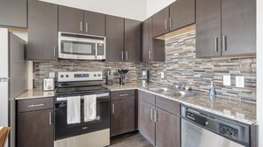 Fridge, dining tables - Landing | Chic 2BD, Gym (Waco)
