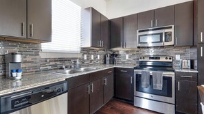 Fridge, dining tables - Landing | Chic 1BD, Gym (Waco)