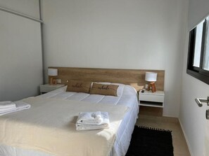 Quarto quádruplo luxo, vista para o jardim | Wi-Fi de cortesia