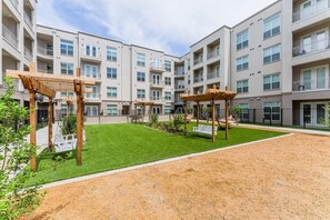 Property grounds - Landing | Modern 2BD, Pool (Arlington)