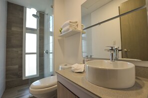 Suite, City View | Bathroom | Shower, free toiletries, hair dryer, towels