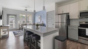 Fridge, dining tables - Landing | Incredible 1BD, Gym, Clubhouse (Vestavia Hills)