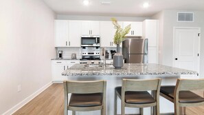Fridge, dining tables - Landing | Stunning 1BD, Gym, Pool (Palm Bay)