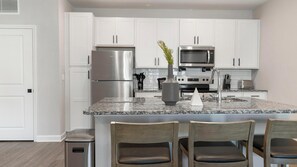 Fridge, dining tables - Landing | Stylish 1BD, Gym, Pool (Palm Bay)