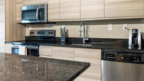 Fridge, dining tables - Landing | Stunning 2BD, Pool, Gym (Clearwater)